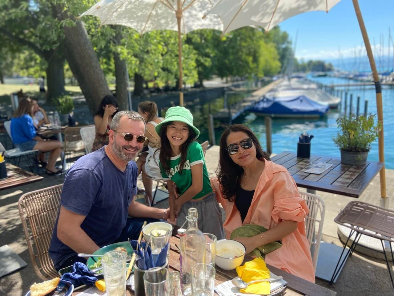 Mr. Tim Alexander and Mrs. Khanthong Ramon with their child Sela