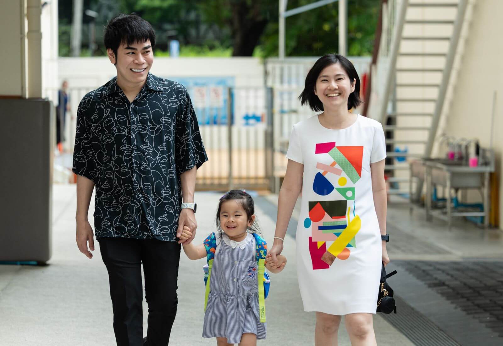 Parents walking their Nursery child into school at St. Andrews Sathorn